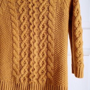 Yellow cable knit sweater